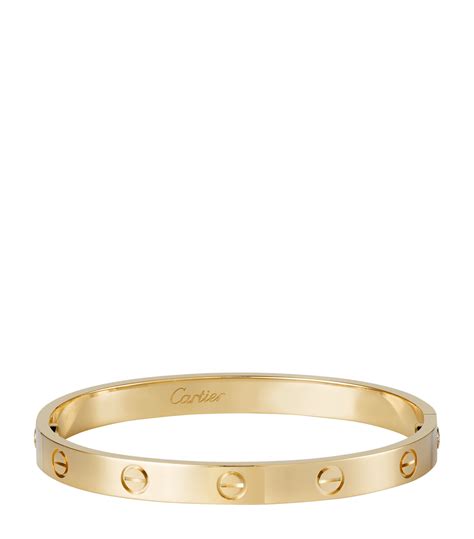 gold love bracelet cartier price|cartier gold bracelet with screws.